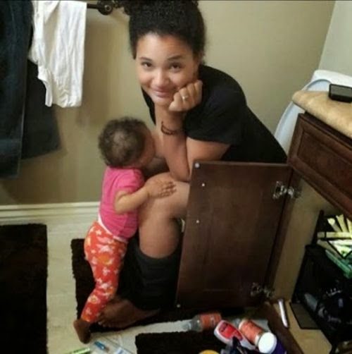 Viral picture of mum breastfeeding baby from the closet