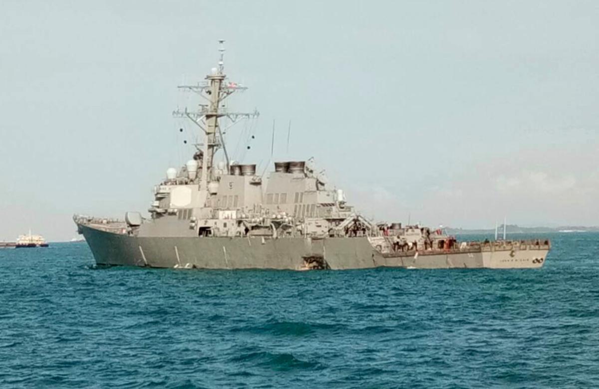 USS John S. McCain docks in Singapore, search still on for 10 missing sailors