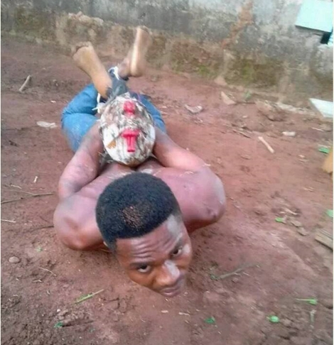 Fake Pastor Caught While Trying to Bury a Pot of Charms Inside a Compound in Anambra State (Photos)