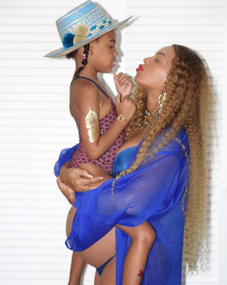 Beyonce exposes her baby bump in a new picture with Blue Ivy