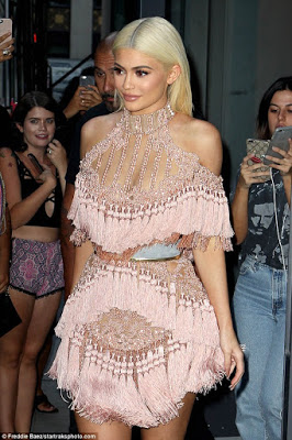 Kylie Jenner walks in a stunning Balmain dress at Party