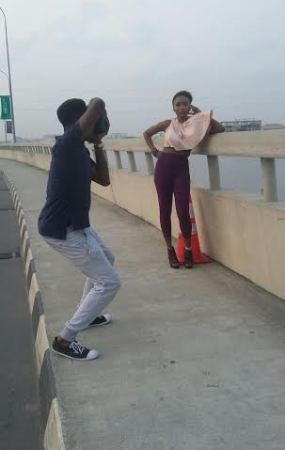 Lagos wind exposes a lady trying to take a photo
