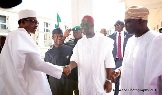 Tag this photo: Buhari shaking hands with Ike Ekweremadu