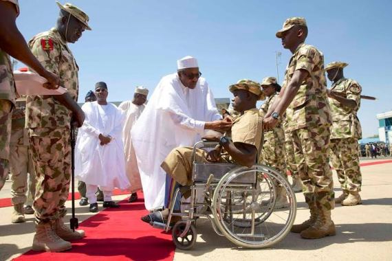 Buhari decorates injured soldiers