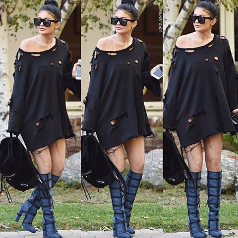 Kylie Jenner steps out in 'ripped shirt'