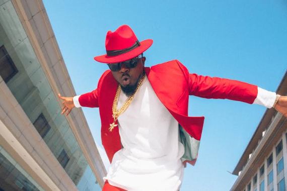 Ice Prince Zamani stuns in red outfit