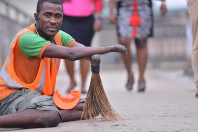 Man who sweeps Lagos bridge and a Traffic Warden nominated for the Made of Black  Campaign