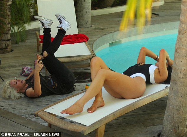Kylie Jenner models at St Barts and Tyga is a spectator