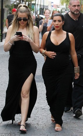 Who are they mourning? Kim and Khloe in black