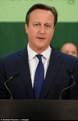 David Cameron returns to No 10 Downing Street