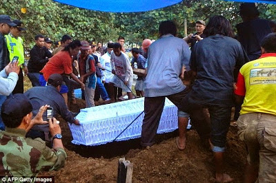 Bodies of Indonesia's drug offenders buried