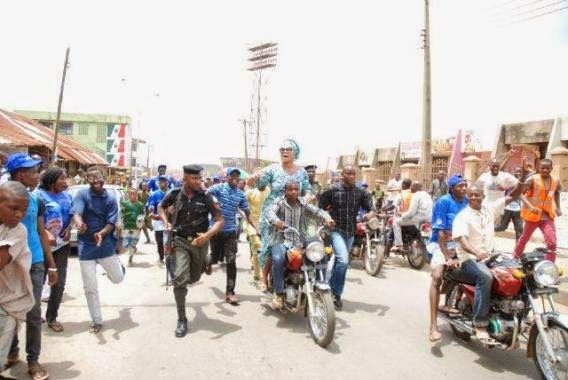 Oyo State PDP Guber Candidate's wife campaigns for him in a motorbike