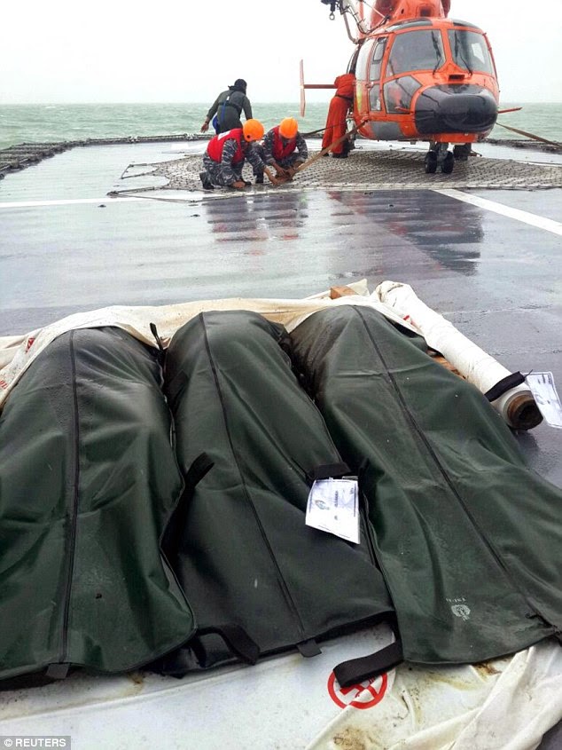 AirAsia wreckage found upside down inside Java Sea