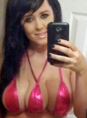 Woman gets third boobs implant just to scare men away (photos)
