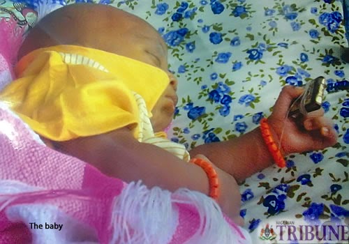 Baby born in Ibadan clutching holy Qur'an